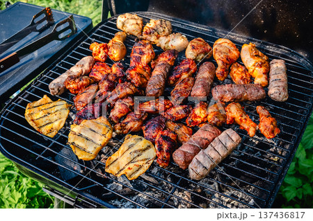 grilled meat over the coals on barbecue grilled meat over the coals on barbecue 137436817
