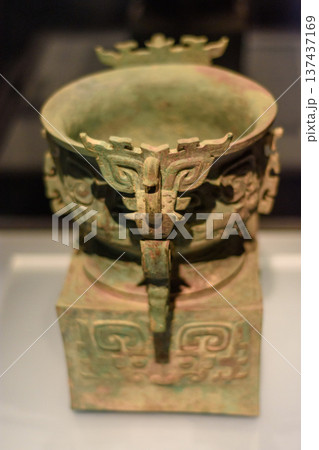 Ancient Chinese bronze vessel (Ding) exhibited in Luoyang museum in Henan province, China 137437169