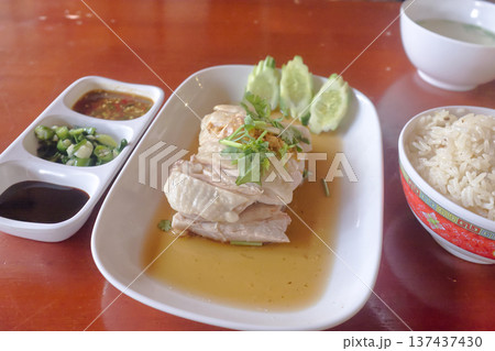 Hainanese chicken rice Singapore style with soy sauce. Hainanese chicken rice Singapore style with soy sauce. 137437430