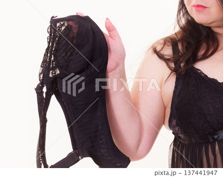 Woman plus size holding bra Woman plus size holding bra 137441947