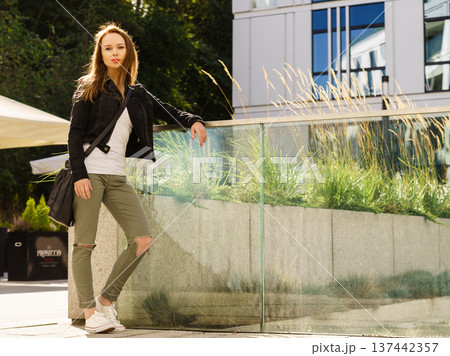 Fashion model outdoor in modern city Fashion model outdoor in modern city 137442357