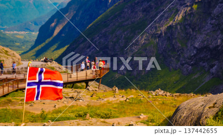 Norwegian flag and Trollstigen viewing point Norwegian flag and Trollstigen viewing point 137442655