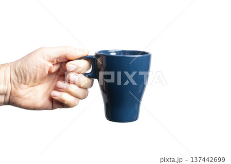 a blue cup in hand 137442699