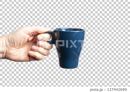 a blue cup in hand a blue cup in hand 137442699