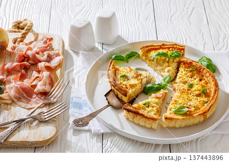 Quiche Lorraine on a white plate, top view Quiche Lorraine on a white plate, top view 137443896