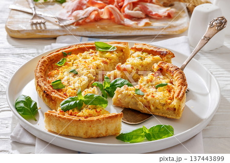 Quiche Lorraine on a white plate, top view Quiche Lorraine on a white plate, top view 137443899