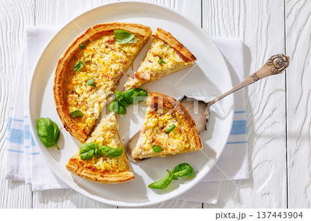 Quiche Lorraine on a white plate, top view 137443904