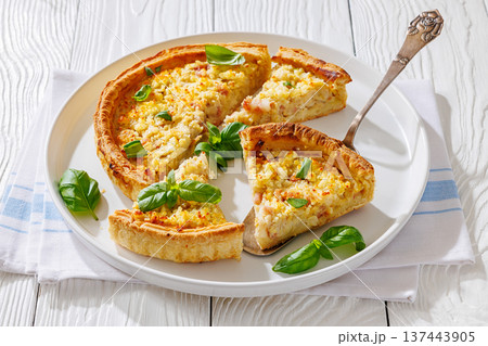Quiche Lorraine on a white plate, top view Quiche Lorraine on a white plate, top view 137443905