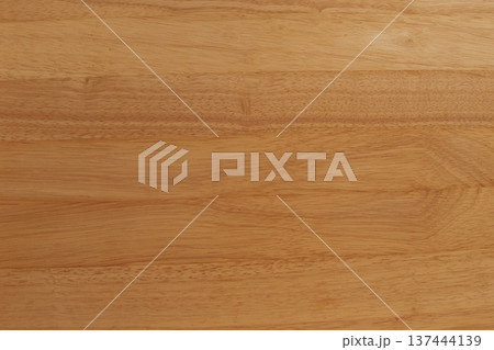 Macro view of natural wood grain and tree rings. Rich timber texture with golden to chocolate brown tones, rustic fibers, and organic patterns for eco-friendly design Macro view of natural wood grain and tree rings. Rich timber texture with golden to chocolate brown tones, rustic fibers, and organic patterns for eco-friendly design 137444139