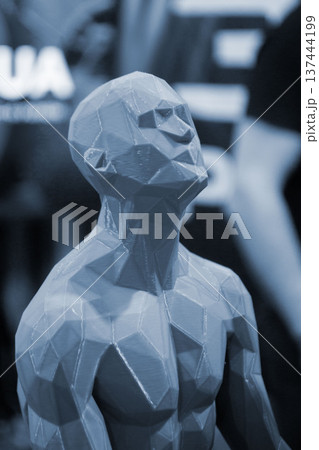 Art object printed on 3D printer. Model printed on 3D printer. 3D printed object. Shape printed on 3D printer from molten plastic. Printing technology. New modern additive FDM printing technologies Art object printed on 3D printer. Model printed on 3D printer. 3D printed object. Shape printed on 3D printer from molten plastic. Printing technology. New modern additive FDM printing technologies 137444199