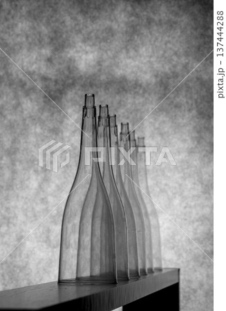 Black and white still life with glassware on a board 137444288