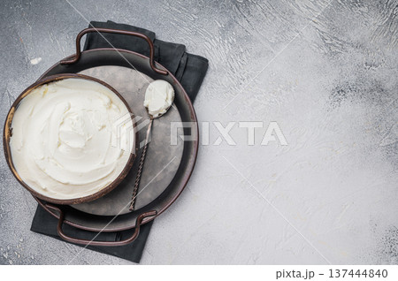 Mascarpone Italian cream cheese in wooden bowl. white background. top view 137444840
