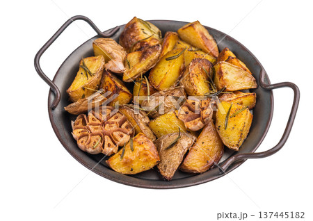 Rustic baked potatoes with skin seasoned with garlic and rosemary. Simple vegetarian side dish overhead view Rustic baked potatoes with skin seasoned with garlic and rosemary. Simple vegetarian side dish overhead view 137445182