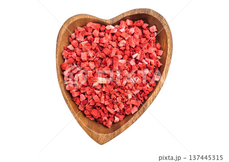 Freeze dried strawberry pieces in bamboo bowl isolated on white background. Vibrant berry ingredient texture flatlay Freeze dried strawberry pieces in bamboo bowl isolated on white background. Vibrant berry ingredient texture flatlay 137445315