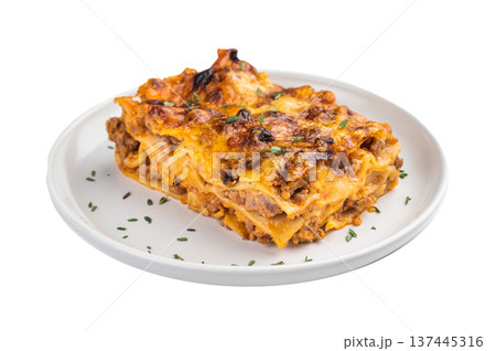 Italian lasagne al forno with minced beef cheese and pasta layers baked until golden close up on white plate Italian lasagne al forno with minced beef cheese and pasta layers baked until golden close up on white plate 137445316