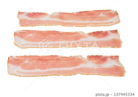 Fresh uncooked bacon rashers thin strips charcuterie ingredient on clean white backdrop ready for cooking or food styling 137445334