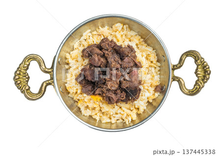 Kawurma qawurma with seared diced meat layered on fluffy pilav, highlighting caramelized surfaces and well-defined grain texture. 137445338