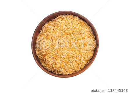 Raw kataifi pastry strands used for kunafa and Middle Eastern desserts. Thin shredded phyllo texture top view 137445348