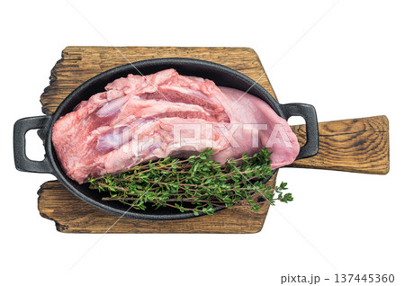 Whole uncooked pork tongue with natural texture shown in cast iron cookware isolated on white background ideal for butchery cuisine concepts Whole uncooked pork tongue with natural texture shown in cast iron cookware isolated on white background ideal for butchery cuisine concepts 137445360