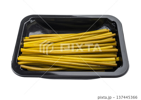 Pickled ramsons stems in black plastic container top view wild garlic ingredient isolated on light background minimal food concept 137445366
