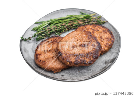 Cooked plant based burger patties served with fresh rosemary and thyme on plate isolated on white background top view Cooked plant based burger patties served with fresh rosemary and thyme on plate isolated on white background top view 137445386