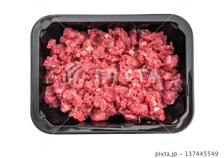 Fresh raw minced beef in a black plastic tray on a clean white background ideal for butcher retail grocery and food stock photography. 137445549
