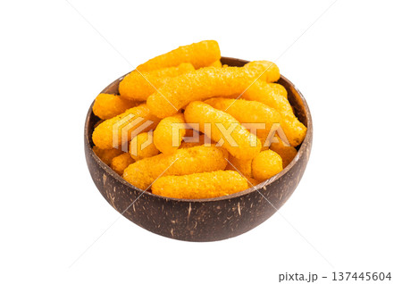 Irresistible Cheese puffs, cheese snacks bursting with bold flavors and a satisfying crunch. isolated on white background. top view 137445604