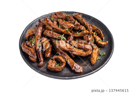 Traditional Asian beef teriyaki with herbs on a plate isolated on white background. top view 137445615