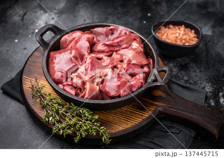 Vibrant raw chicken liver, perfect giblets for those seeking a protein-rich addition to their meals.black background. top view 137445715