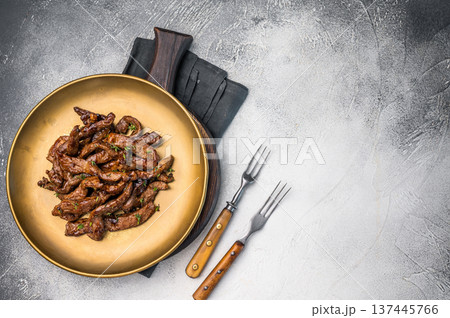 Asian food Teriyaki beef meat on a plate on grey background. top view Asian food Teriyaki beef meat on a plate on grey background. top view 137445766