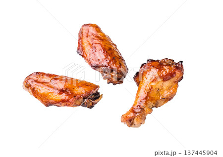 Deliciously sticky teriyakis sauce chicken wings, bursting with flavor, perfect for sharing at festive occasions or family dinners. isolated on white background. top view Deliciously sticky teriyakis sauce chicken wings, bursting with flavor, perfect for sharing at festive occasions or family dinners. isolated on white background. top view 137445904