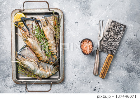 Freshly caught raw rosenbergii prawn displayed elegantly, highlighting their natural beauty and premium quality. grey background. top view 137446071