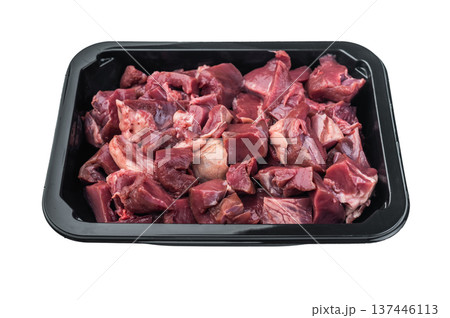 Raw cubes of pork hearts ready for braising or frying, ideal for gourmet offal dishes and rich homemade meals. 137446113