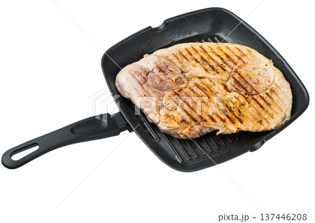 Grilled bone in pork shoulder cooked in grill pan juicy meat with grill marks isolated on white background for barbecue and dinner Grilled bone in pork shoulder cooked in grill pan juicy meat with grill marks isolated on white background for barbecue and dinner 137446208