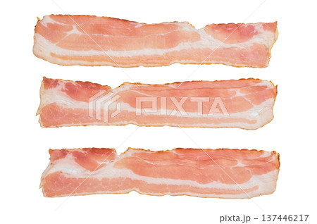 Fresh uncooked bacon rashers thin strips charcuterie ingredient on clean white backdrop ready for cooking or food styling Fresh uncooked bacon rashers thin strips charcuterie ingredient on clean white backdrop ready for cooking or food styling 137446217