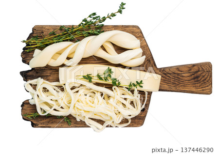 Assortiment of Traditional Caucasian Chechil white cheese isolated on white background. 137446290