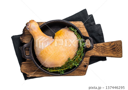 Fresh Raw farm chicken leg in a skillet ready for cooking, poultry meat isolated on white background Fresh Raw farm chicken leg in a skillet ready for cooking, poultry meat isolated on white background 137446295