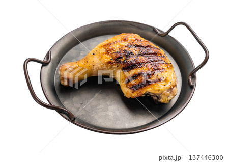 Delicious grilled chicken leg or quarter with salt and spices, roasted poultry meat isolated on white background. 137446300