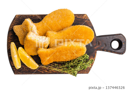 Deep fried Fish fingers on wooden board isolated on white background. top view Deep fried Fish fingers on wooden board isolated on white background. top view 137446326
