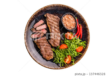 BBQ Grilled skirt or machete Steak, beef meat on a plate with salad isolated on white background BBQ Grilled skirt or machete Steak, beef meat on a plate with salad isolated on white background 137446328