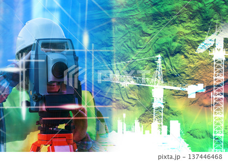 Surveyor operates precise instrument against vibrant digital backdrop Surveyor operates precise instrument against vibrant digital backdrop 137446468