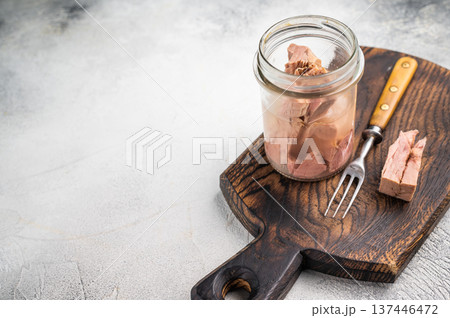 Versatile tinned canned tuna ready to elevate your recipes, from pasta dishes to hearty casseroles. white background. top view 137446472