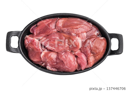 Fresh raw quail breast fillets in a black cast iron skillet, isolated on a white background. High-protein healthy food. 137446706