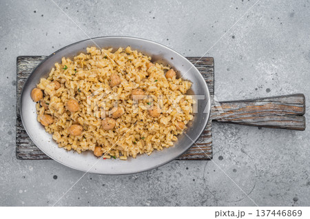 Traditional Turkish bulgur pilav nohutlu with chickpeas healthy vegan dish on light stone background overhead 137446869