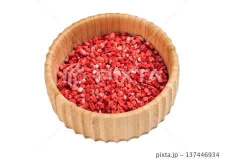 Freeze dried strawberry pieces in bamboo bowl isolated on white background. Vibrant berry ingredient texture flatlay Freeze dried strawberry pieces in bamboo bowl isolated on white background. Vibrant berry ingredient texture flatlay 137446934