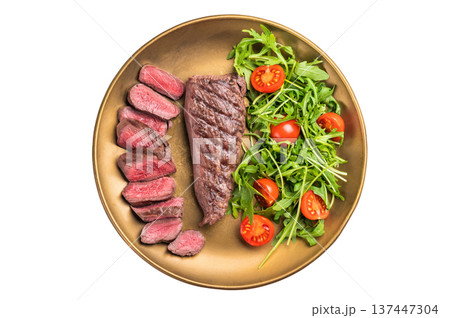 Grill Goat steak, roasted tenderloin fillet meat with salad isolated on white background. top view Grill Goat steak, roasted tenderloin fillet meat with salad isolated on white background. top view 137447304