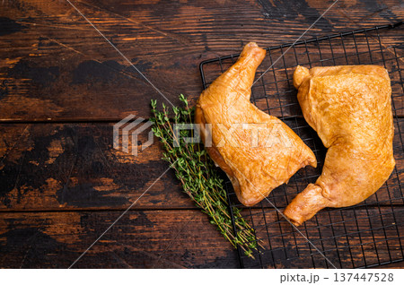 Hot smoked chicken leg, poultry meat meal. wooden background. top view Hot smoked chicken leg, poultry meat meal. wooden background. top view 137447528