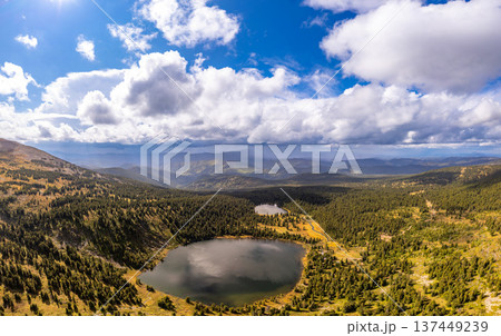 Aerial top view of Karakol lake. Seven cleanest mountains lakes at different altitudes, connected by rivers or streams. North-Chuisky Ridge. Bagatash Pass, Republic Gorny Altai, Siberia, Russia, Asia 137449239
