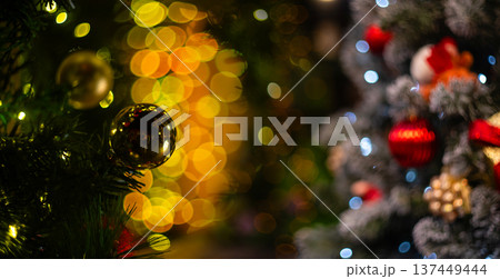 Blurred holiday background with bokeh. Defocused New Year and Christmas illumination 137449444