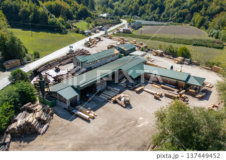 Aerial view of a sawmill factory in the mountains Aerial view of a sawmill factory in the mountains 137449452